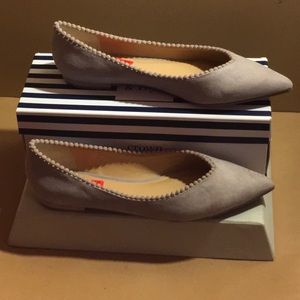 Suede Taupe Crown and Ivy pointed toe flats.